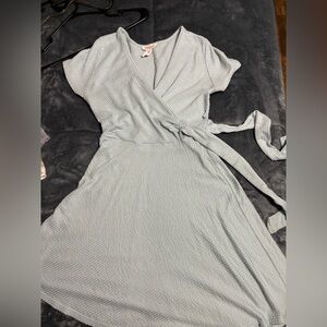 Medium sized rolla coster dress v shape neck
